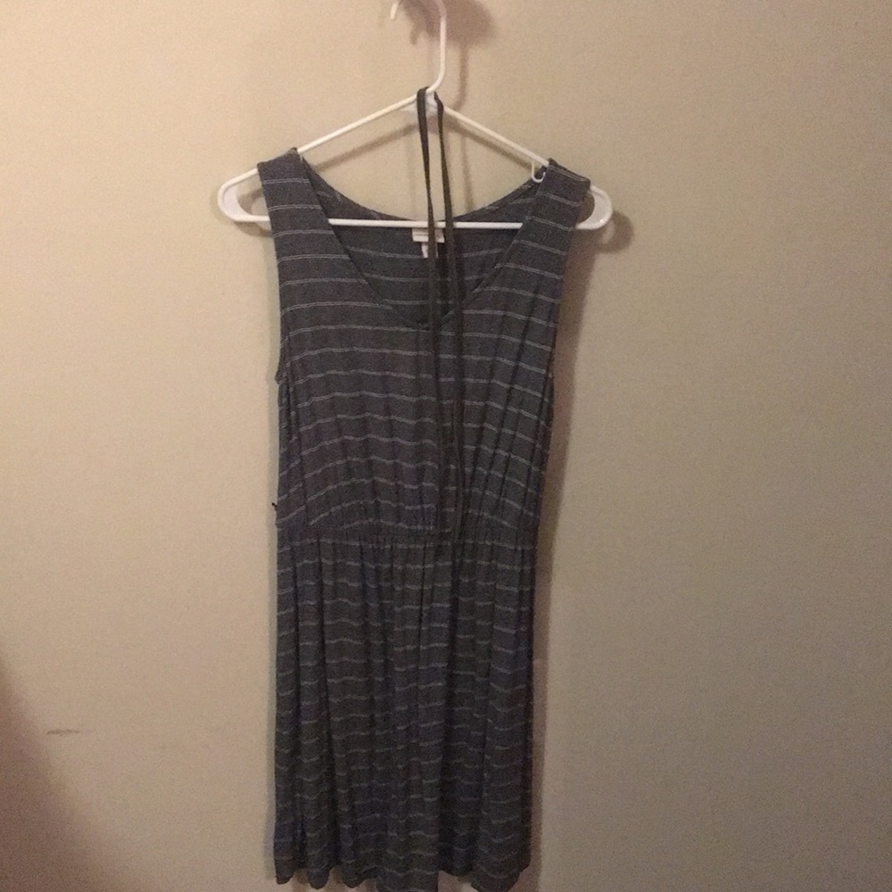 Gray striped dress with green tie around the waist